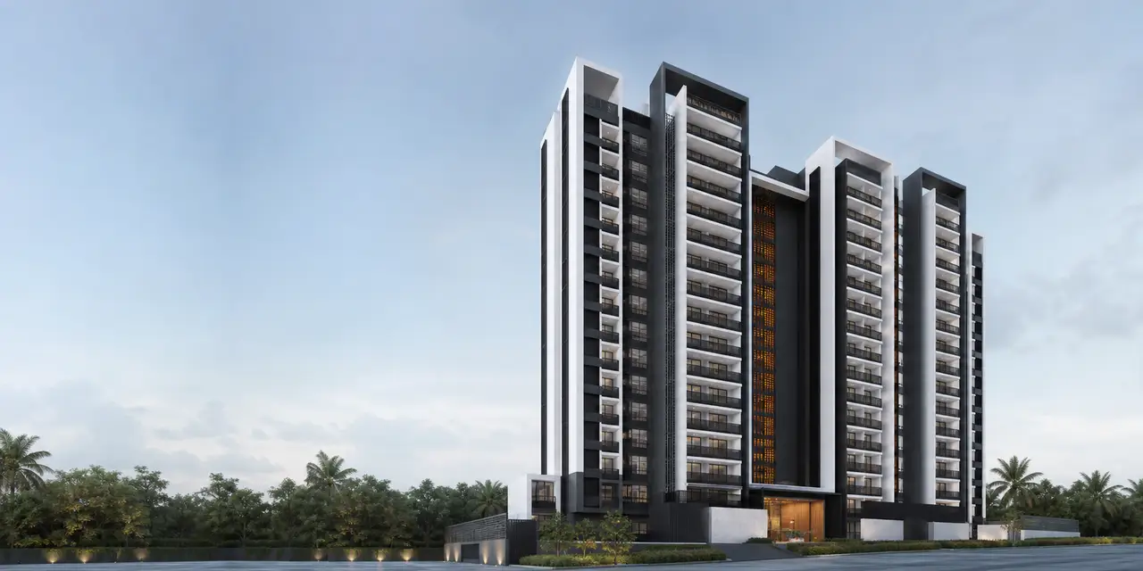 Embassy Millennium contemporary high-rise residential elevation with warm lighting against a blue-grey sky
